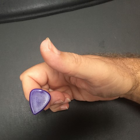 How to hold a guitar 3