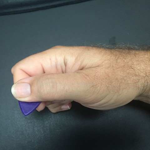 How to hold a guitar 4
